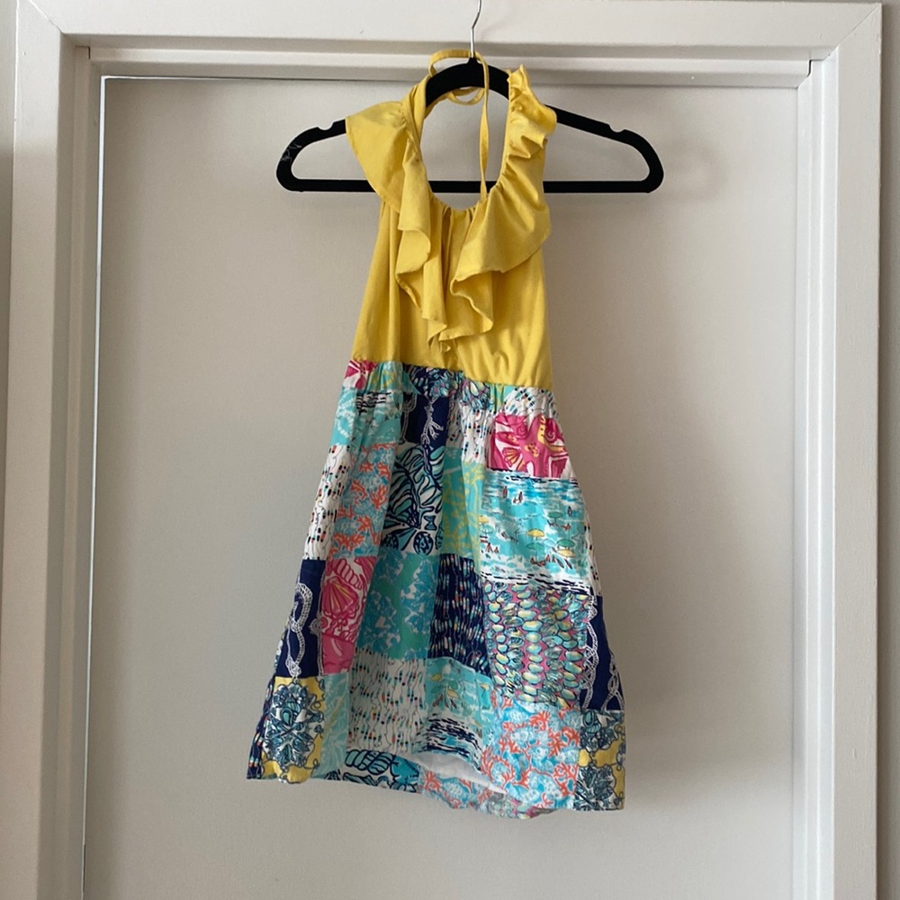 Yellow and pattern Lilly Pulitzer halter dress With ruffle neck and has pockets